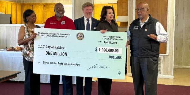 Thompson presents funds for Forks to Freedom project
